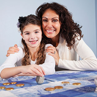 A mother and daughter smiling. Links to Gifts That Protect Your Assets